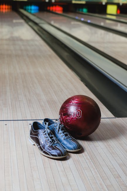 Bowling ball and shoes signifying active hobbies
